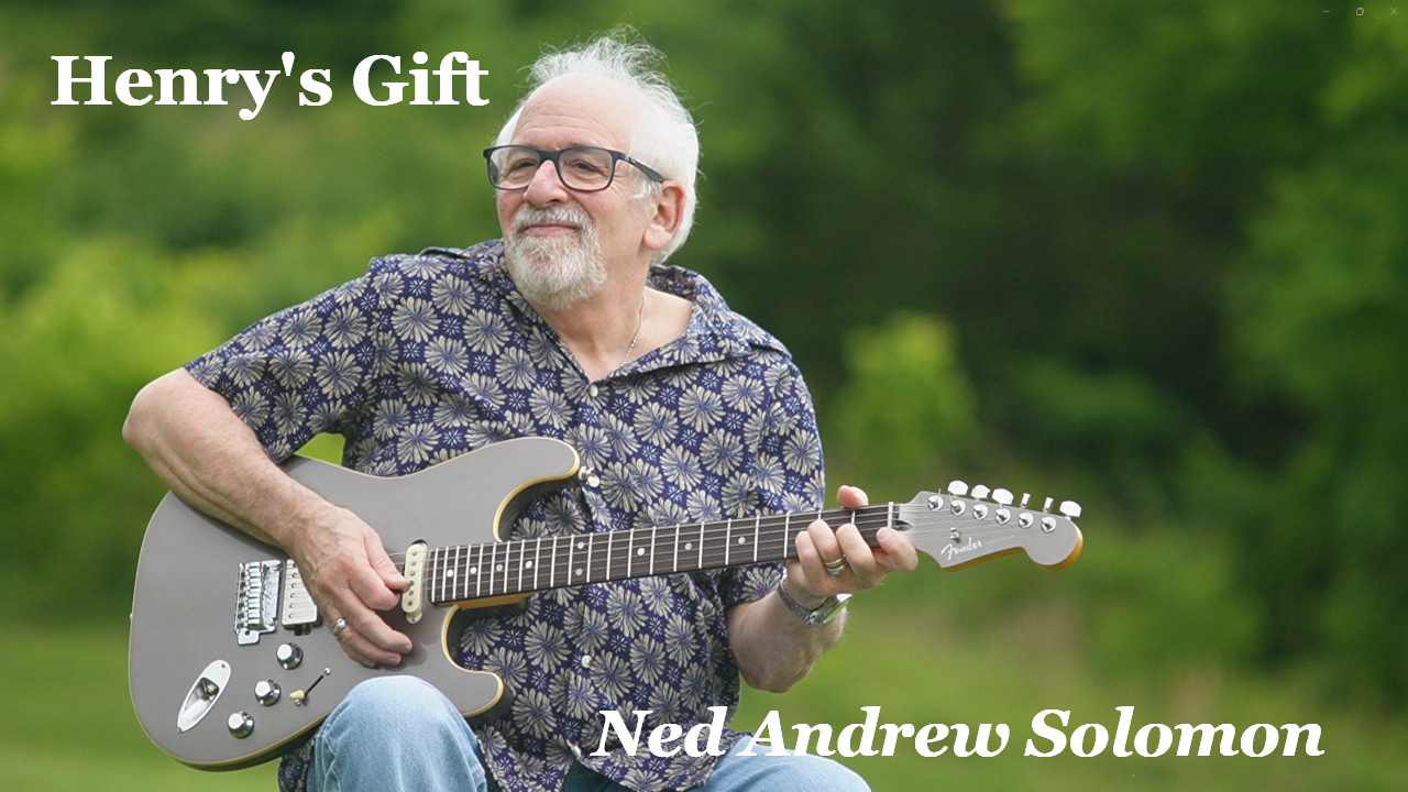Henry's Gift Thumbnail with Ned Andrew holding his Fender electric Guitar
